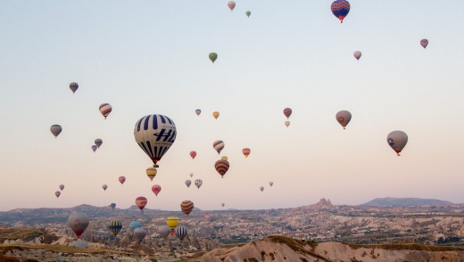 The skies above Cappadocia are filled with hot air balloons.