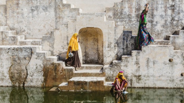 Water carriers at the step well.