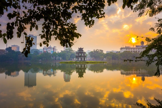Hoan Kiem Lake in Hanoi, Vietnam: During the day Hanoi's Hoan Kiem Lake is something of a touristy hotspot but wake ...