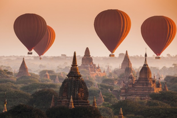 Bagan, Myanmar: More than 2200 temples and pagodas dot the countryside of Bagan and the best way to see them is from the air.