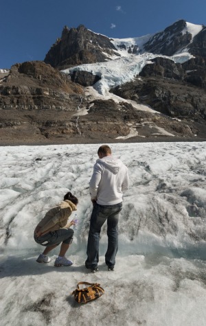 Guide Michael Rex with T Rex mascot inside his Ice Explorer.