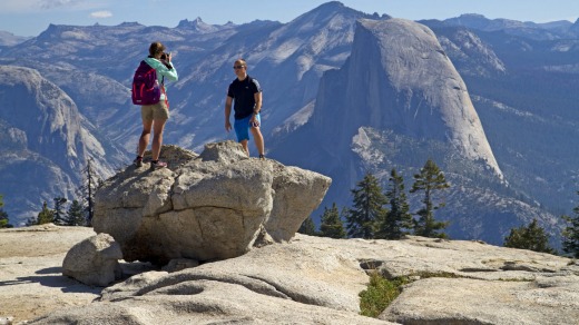 Photo time on Sentinel Dome, with Half Dome behind.