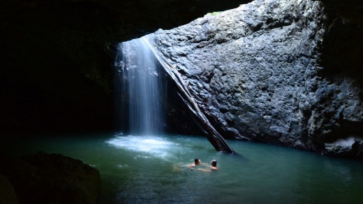 Have a swim in Natural Bridge at Springbrook National Park.