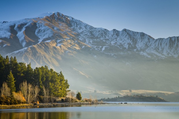 Wanaka flightseeing: With the snow-capped mountains of Mt Aspiring National Park in the background, the landscape around ...