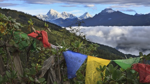 Mount Jumolhari at 7300 metres,  seen through prayer flags from Chele La Pass.