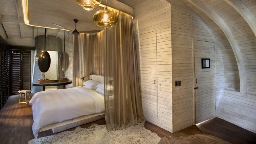 A bedroom at Sandibe Lodge.