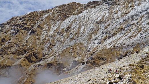 Trekkers below Kopra Ridge in the Annapurnas Kopra, in Nepal.