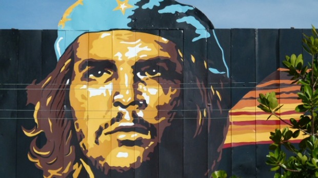 A portrait in Havana of Che Guevara, one of the world's most famous travellers.