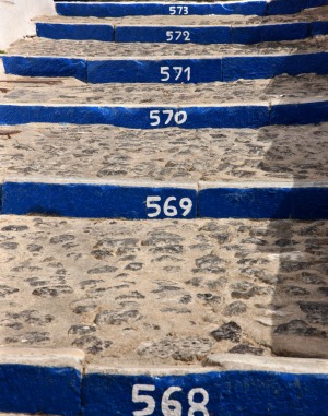 Some of the hundreds of stairs that connect Fira village with, Gyalos, the old port of Santorini island, Cyclades.
