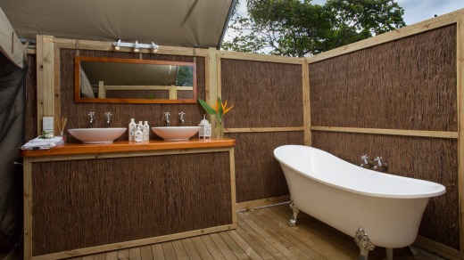 Yopen air ensuite bathroom at Ikurangi Eco Retreat.