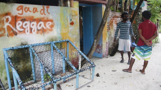 Girls playing the Maldivian game of basi.