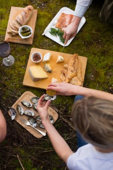 Visitors enjoy seafood and other local offers on Tasmania's Bruny Island.