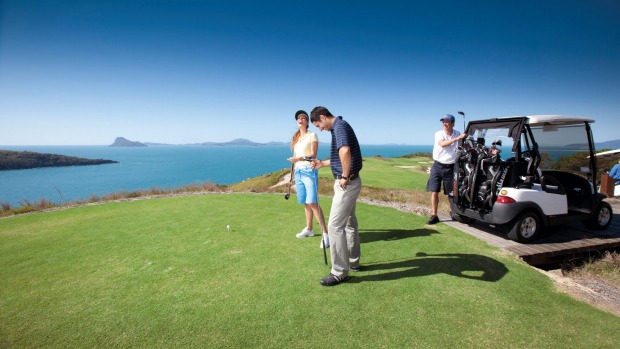 Playing a round of golf on Dent Island's impressive 18-hole championship course.