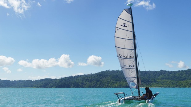 Sail around the island and stop at deserted beaches for a swim.