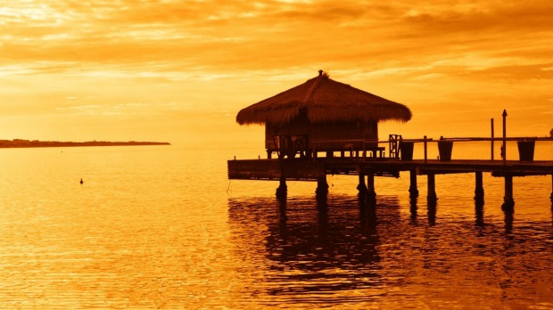 Hilutongan fisherman  make better money offering accommodation in thatched huts on stilts