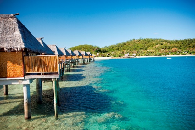 Likuliku Lagoon Resort, Fiki: The over-water bungalows offer superlative ocean views, and glass-floor panels reveal ...