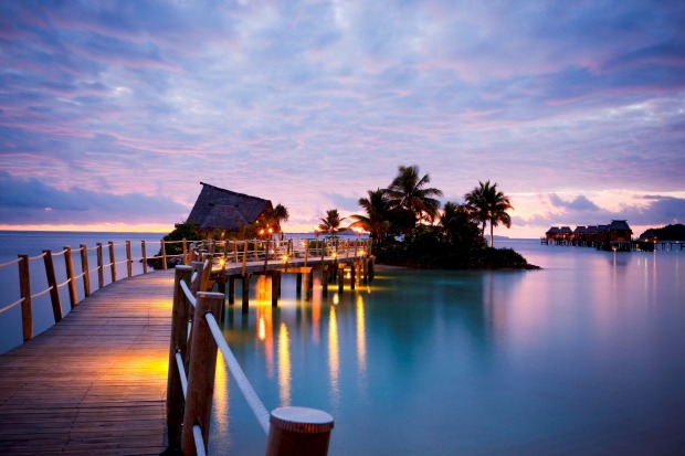 Likuliku Lagoon Resort, Fiki: The over-water bungalows offer superlative ocean views, and glass-floor panels reveal ...