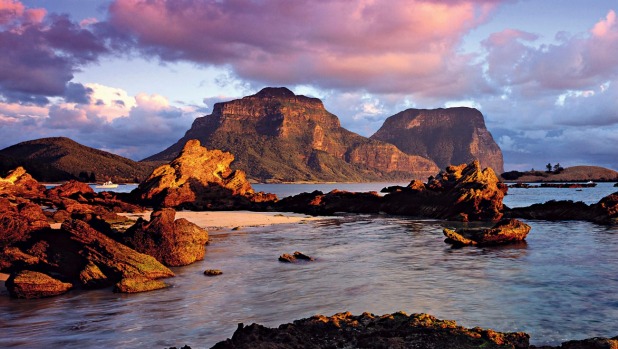 Sunset at North Bay with views of Mount Gower and Mount Lidgbird.