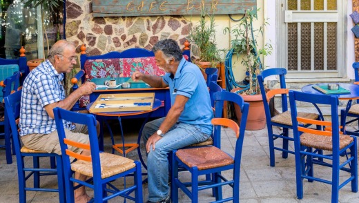 At sunset local men gather in the sleepy taverns in the village of Paleochora.