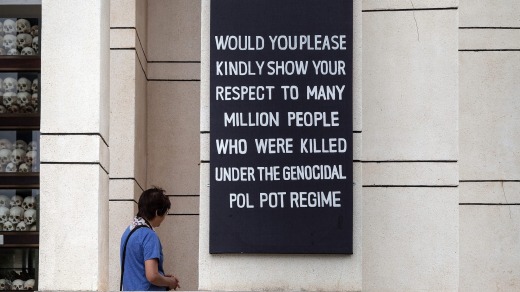 A visitor to the Choeung Ek Genocide Museum, also known as the Killing Fields.