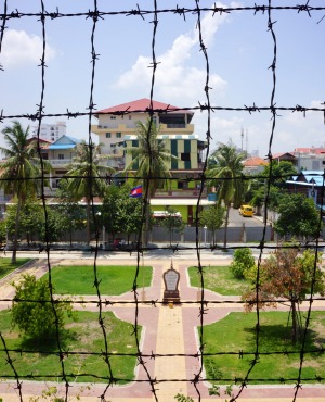 Toul Sleng through barbed wire.