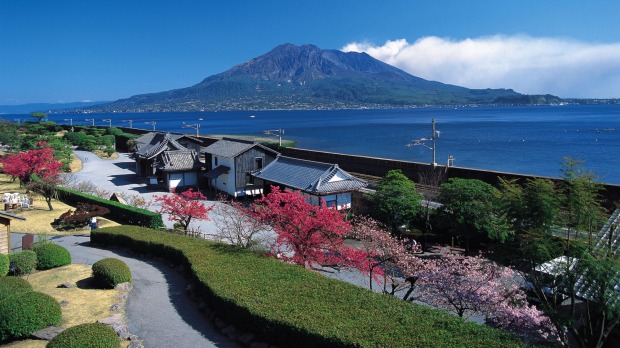 A view over the gardens of Sengan-en Villa to Sakurajima volcano in Kagoshima.