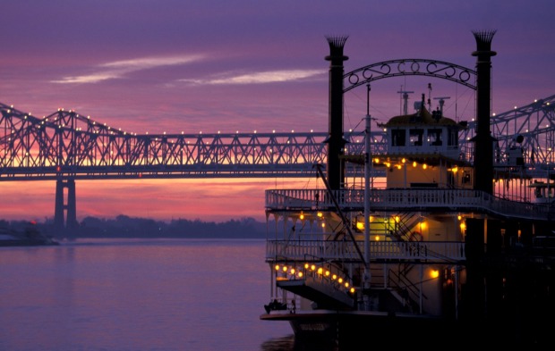 The Cajun Queen on the Mississippi River at sunrise New Orleans, Louisiana, US.