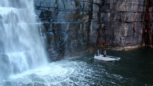 The King George Falls thunder down the 80-metre cliff, dwarfing The Great Escape's tender boat.