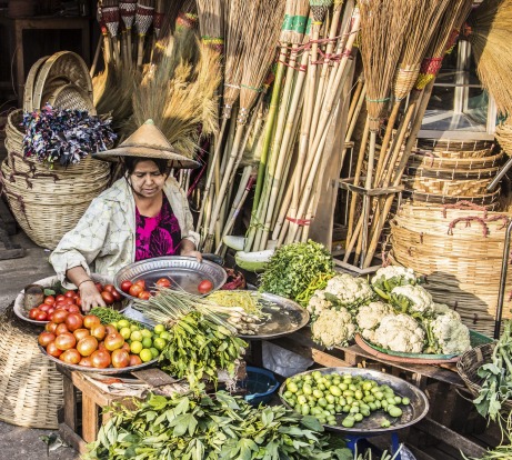 A woman sells vegetables on the market of Mawlamyine, Myanmar.