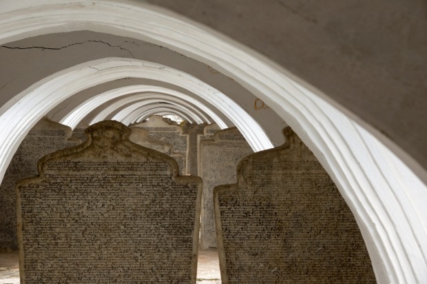 WORLD'S BIGGEST BOOK: At the foot of Mandalay Hill are the Kuthodaw Inscription Shrines – 729 stone slabs inscribed with ...