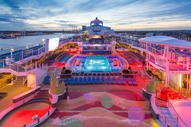 Anthem of the Seas' pool deck at sunset.