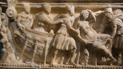 The abduction of Helen as depicted on an Etruscan funerary container.