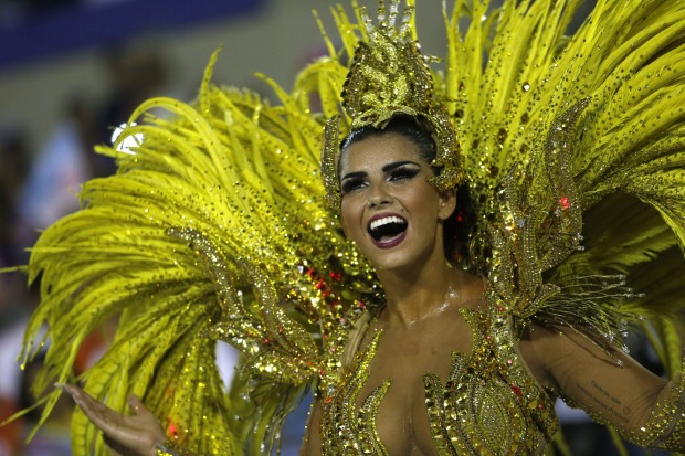 Drum queen Bianca Leao, from Uniao da Ilha samba school, dances during Carnival parade at the Sambadrome, in Rio de ...
