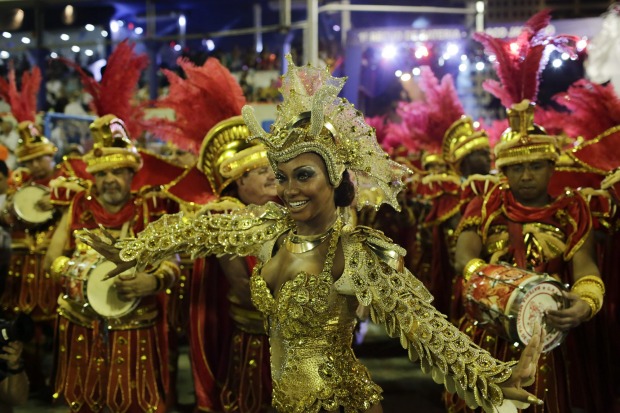 Drum queen Luana Bandeira, from Estacio de Sa samba school, dances during the Carnival parade at the Sambadrome in Rio ...