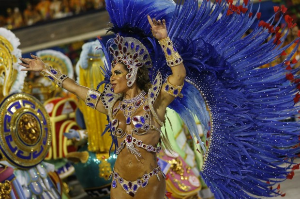 Performer from the Uniao da Ilha samba school parades during Carnival celebrations at the Sambadrome in Rio de Janeiro, ...