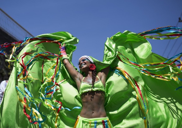 A reveller performs at the "Carmelitas" block party during Carnival celebrations in Rio de Janeiro, Brazil.