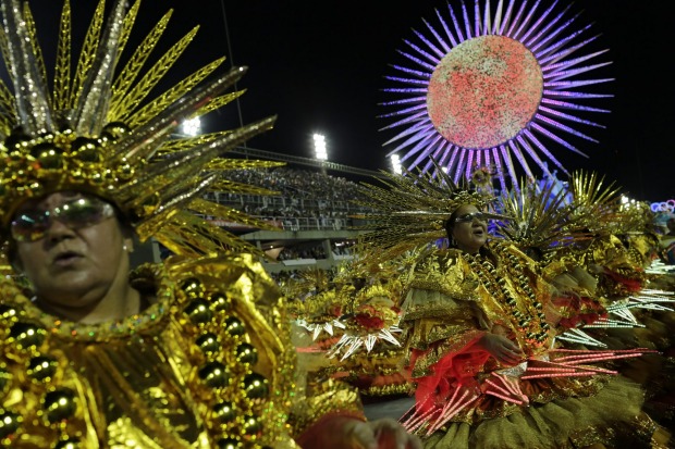 Performers from Uniao da Ilha samba school parade during the Carnival celebrations at the Sambadrome in Rio de Janeiro, ...