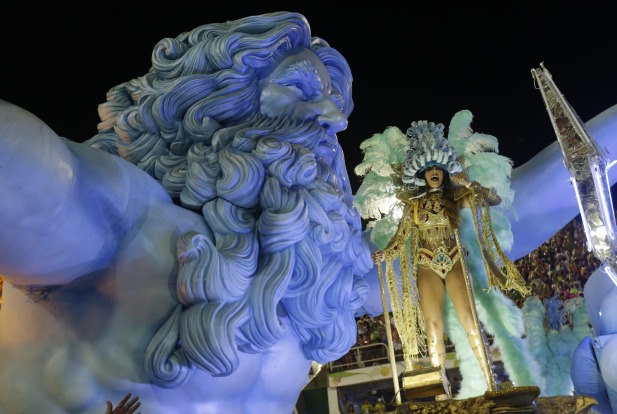 A performer from the Uniao da Ilha samba school parades on a float during carnival celebrations at the Sambadrome in Rio ...