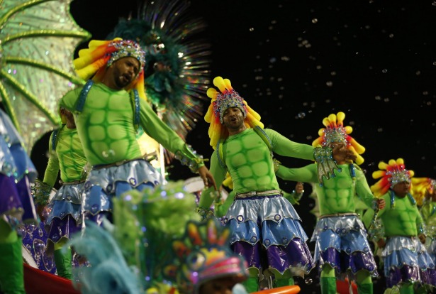 Performers from the Uniao da Ilha samba school parade during Carnival celebrations at the Sambadrome in Rio de Janeiro, ...