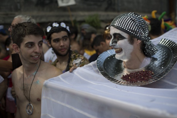 Revellers enjoy the "Ceu na Terra", or Heaven on earth, block party during Carnival celebrations in Rio de Janeiro, Brazil.