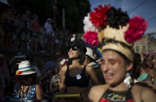 A reveller performs at the "Ceu na Terra", or Heaven on earth, block party during Carnival celebrations in Rio de ...
