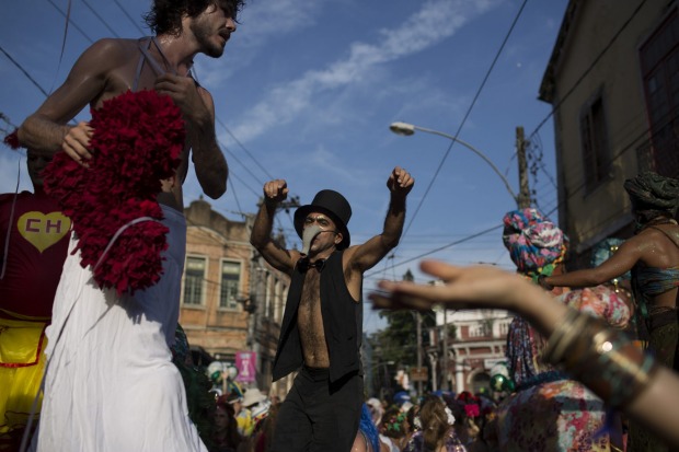 Revellers perform at the "Ceu na Terra", or Heaven on earth, block party during Carnival celebrations in Rio de Janeiro, ...