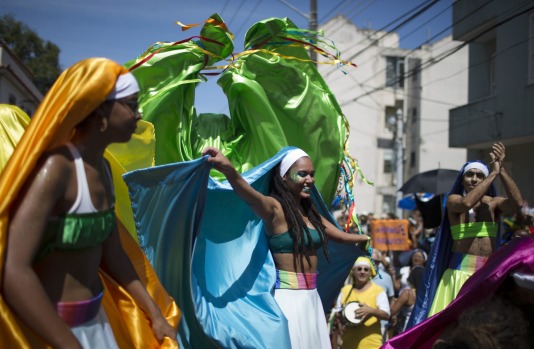 Revelers perform at the "Carmelitas" block party during Carnival celebrations in Rio de Janeiro, Brazil, Friday, Feb. 5, ...