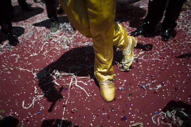 The 2016 Carnival King Momo, Wilson Dias da Costa Neto, performs at a ceremony marking the official start of Carnival in ...