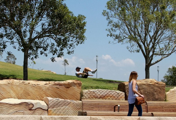 People enjoying the hot weather at Barangaroo.