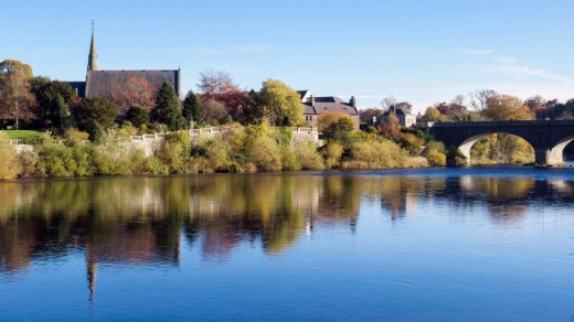 Abbey by St Andrews church and bridge from across the River Tweed.