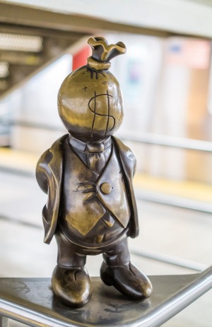 One of Tom Otterness' 'Life Underground' bronze statues in the 14th and 8th Street underground stations. Credit ...