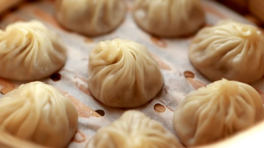 Beautifully presented snacks on a street stall in Chengdu whet one's appetite.