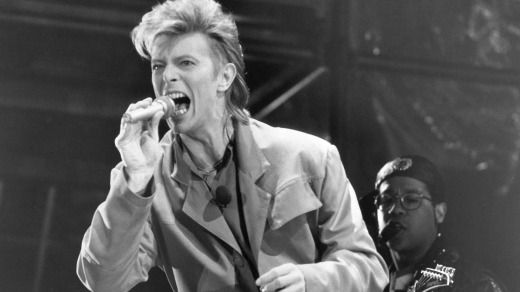 David Bowie performing during a concert at the Reichstag.