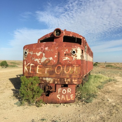Last train: derelict Ghan loco for sale in the town of Marree.